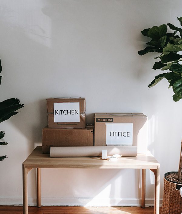 brown cardboard boxes on brown cardboard box